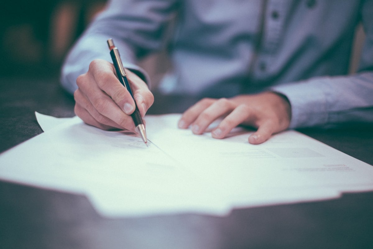 Attorney reviewing Defense Base Act documentation